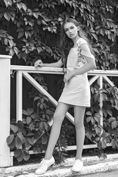 Teen girl outdoor. Black and white photo