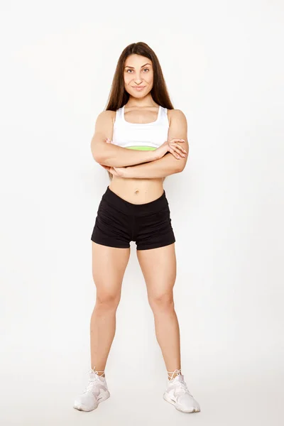 Sports girl on a white background — Stock Photo, Image