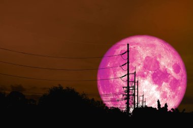 Süper pembe ay bir elektrik direği, Nasa tarafından döşenmiş bu görüntü unsurları gölge yukarıda gökyüzünde yüzen