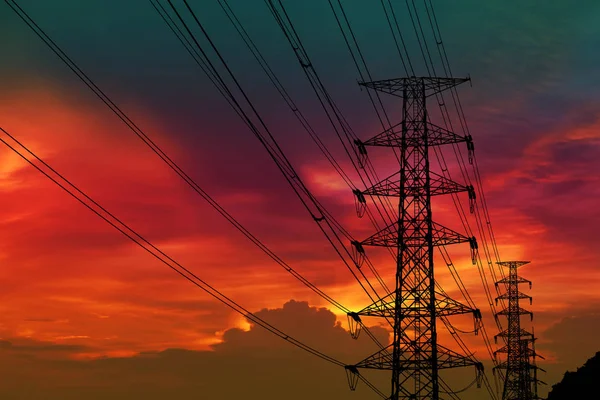 Silhouette Strommast Und Stromleitung Und Farbenfroher Himmel Bei Sonnenuntergang — Stockfoto