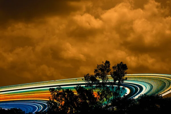 saturn ring back on silhouette dry tree and night sky,Elements of this image furnished by NASA