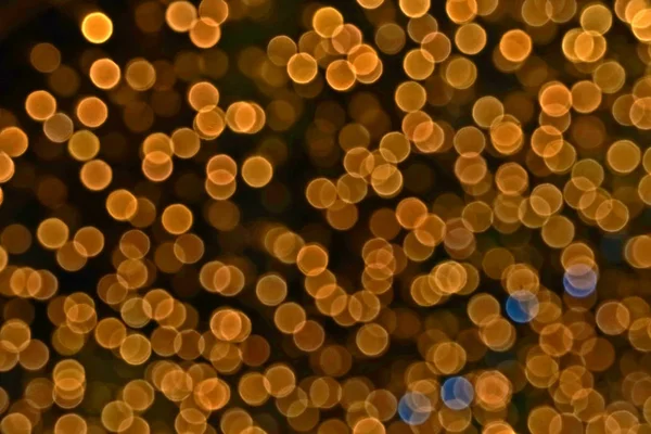 ぼかしとボケのカラフルな光と夜の銅色の抽象 — ストック写真