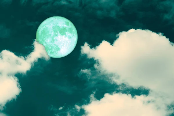 Green strawberry moon back on silhouette heap cloud on night sky — Stock Photo, Image