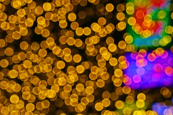 ぼかしとボケのカラフルな光と夜gのゴールドカラー抽象 — ストック写真
