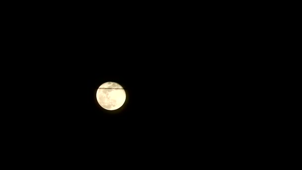 Moon move on dark night sky and  pass back power electric line1 — Stock Video