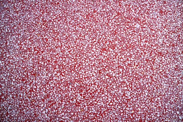 Polierter Steinboden rosa Hintergrund und weißer kleiner Stein inte — Stockfoto