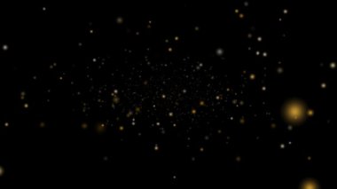 Derin altın kar ve buz tozu yavaşça düşüyor ve solmuş galaksi uzayda dönüyor