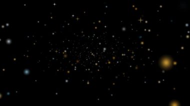 Derin altın kar ve buz yıldızı tozu yavaşça düşüyor ve siyah ekranda soluyor.