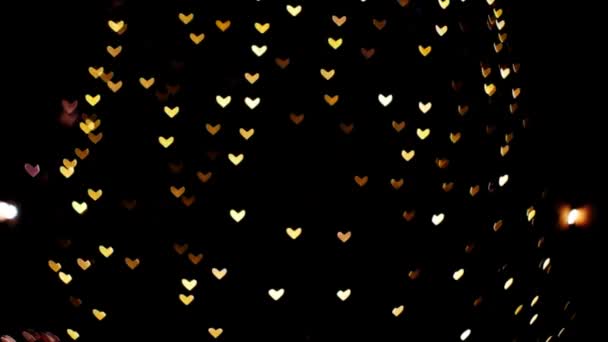 Rozmycie i bokeh kształt serca pojazdu i samochodu na drodze w nocy — Wideo stockowe