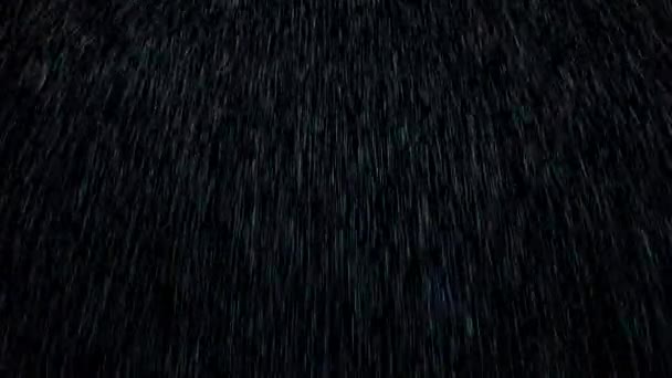 Rain drop normal particles effect on the black screen — Stock Video