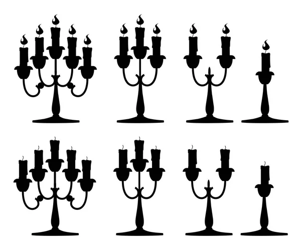 Sílhueta preta. Velas em castiçais. Candelabro de prata com velas vermelhas acesas. Ilustração vetorial plana isolada sobre fundo branco — Vetor de Stock