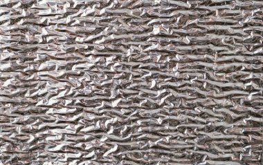 Simli parlak duvar kaplaması, ısı yalıtım malzemesi. Yatay çizgiler.