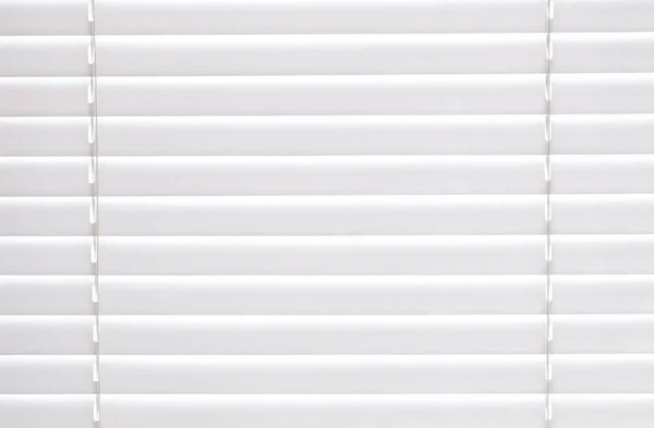 Blinds of white color texture on the window.