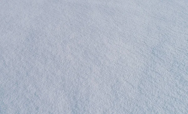 Textura blanca de nieve limpia natural en exterior . — Foto de Stock