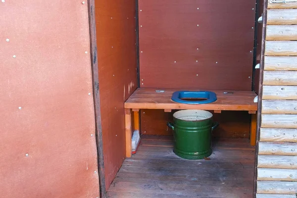 Outside toilet with a pot in village. — Stock Photo, Image