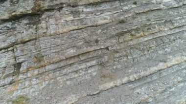 Rock yakından görmek. Gri ve sarı rock doku küçük taşlarla.