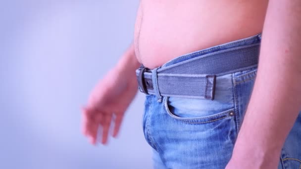 Man touches his flabby fat naked stomach, side view. — Stock Footage Man touches his flabby fat naked stomach, side view. Stock Video
