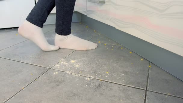 Woman Goes On The Dirty Floor In The Kitchen Leftovers And Crumbs Fall On The Kitchen Floor Legs In White Socks Close Up Side View Video By C Familylifestyle Stock Footage Woman Goes On The Dirty Floor In The Kitchen Leftovers And Crumbs Fall On The Kitchen Floor Legs In White Socks Close Up Side View Video By C Familylifestyle Stock Footage