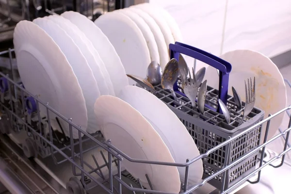 Sishwasher with dirty white dishes. — Stock Photo, Image