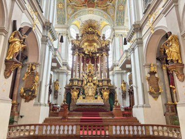 The altar of St. Peter's Church surrounded by masterpieces of world icon painting. gilded bas-reliefs of saints and an unsurpassed ceiling painting that glorifies the one God.