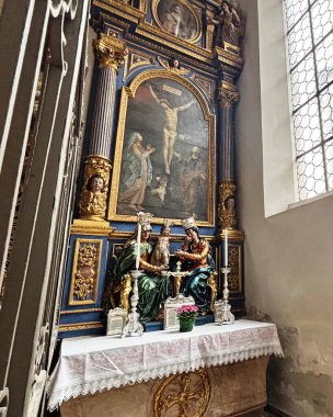 The interior of St. Peter's Church is filled with priceless masterpieces of painting on religious themes of the Renaissance.