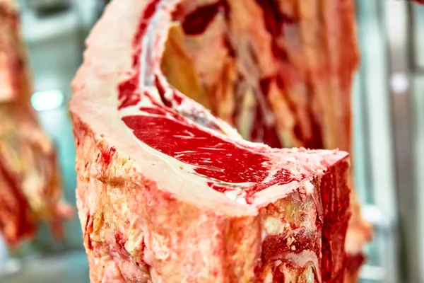 Slaughterhouse meat processing plant, cut marble beef.