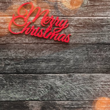 Eski ahşap arka plan kare. Kırmızı Christmas Merry yazıt, metin için yer. Üstten görünüm. Efekt ışıkları