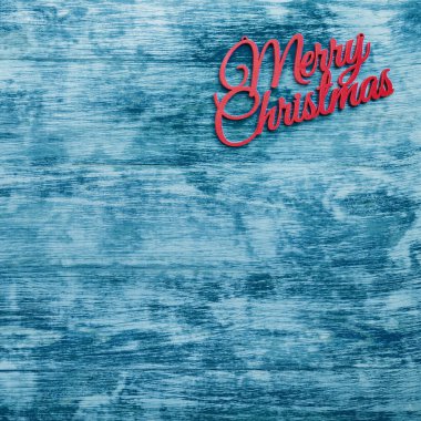 Mutlu Noeller kare kartı üstten görünüm, mavi ahşap arka plan. Xmas kutlama metin için yer