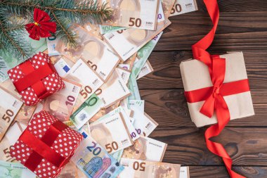 Noel hediyeler banknotlar farklı değerler ile arka plan. Kitap planlama. Üstten görünüm.