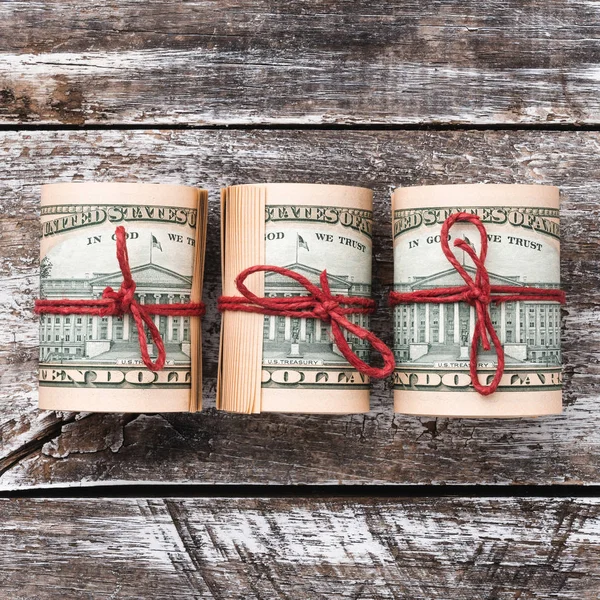 Old wood background, American money. Top view. Business and risk. Space for text. Xmas square card.