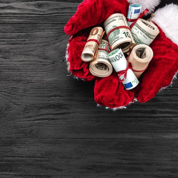 Black Wooden Background Santa Hands Full Money Christmas Card Top — Stock Photo, Image