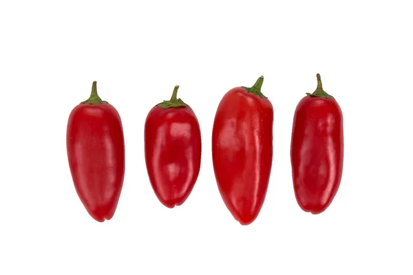Ovely Cztery Mini Red Peppers Białym Wyizolować Tła Świeże Warzywa — Zdjęcie stockowe