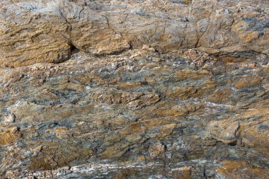 Renkli soyut rock doku ve yüzey arka plan. Yıpranmış doğal taş arka plan