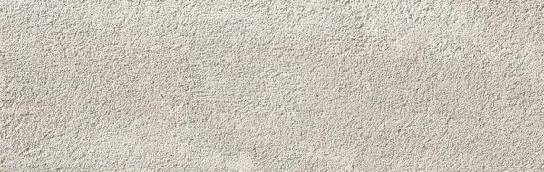 Arkaplan veya tasarım kullanımı için kabataslak beyaz alçı duvar yüzeyine yakın plan