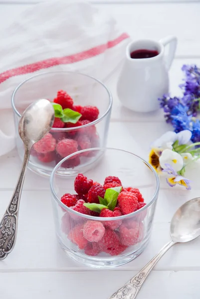 Fresh Organic Raspberries in glasses for Breakfast Stock Image