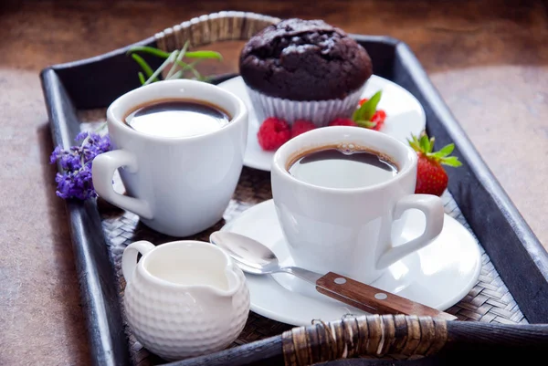 Black Coffee and chocolate muffins for breakfast — Stock Photo, Image