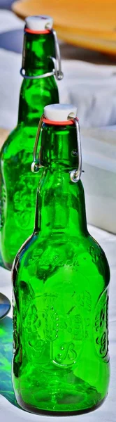 Close up of old fashioned green beer bottle