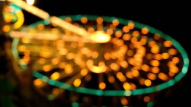 Eğlence Parkı bokeh, cityscape akşam zaman.
