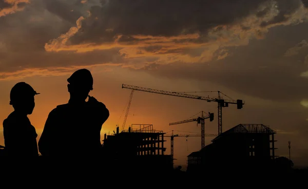 Silhouette engineer standing work on construction. — Stock Photo, Image
