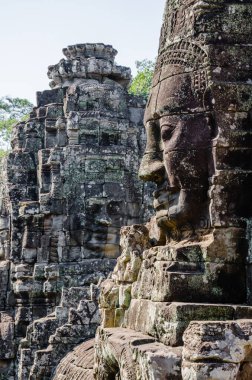 Angkor Thom 'daki Bayon Tapınağının Gülen Yüzleri Siem Reap Eyaleti, Kamboçya' daki Khmer İmparatorluğu 'nun Mirası' dır..