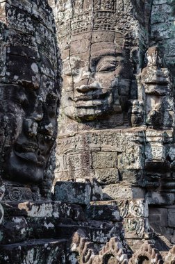 Angkor Thom 'daki Bayon Tapınağının Gülen Yüzleri Siem Reap Eyaleti, Kamboçya' daki Khmer İmparatorluğu 'nun Mirası' dır..