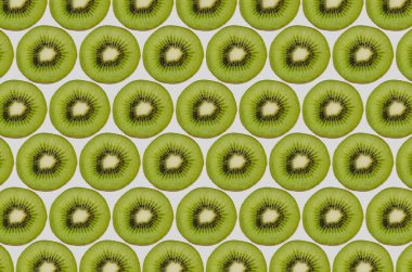 Dilimlenmiş Kivi Beyaz Arkaplanda Desendir.