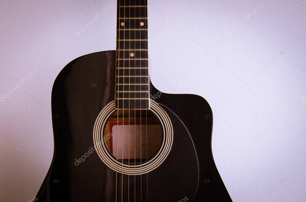 The Old Guitar in Warm Color Theme.