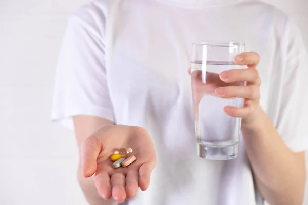 Outstretched Palm Shows Different Pills Take Holds Glass Water — Stock Photo, Image