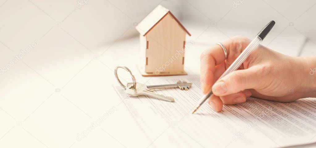 mortgage and housing rent. Keys, house and hand that signs documents