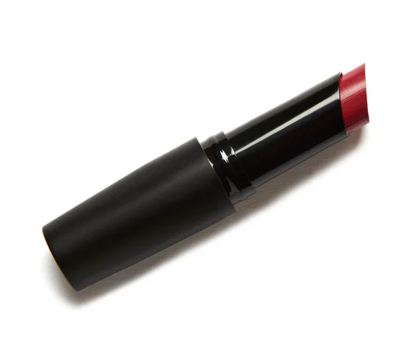 Lápiz Labial Rojo Con Paquete Negro Aislado Sobre Fondo Blanco — Foto de Stock