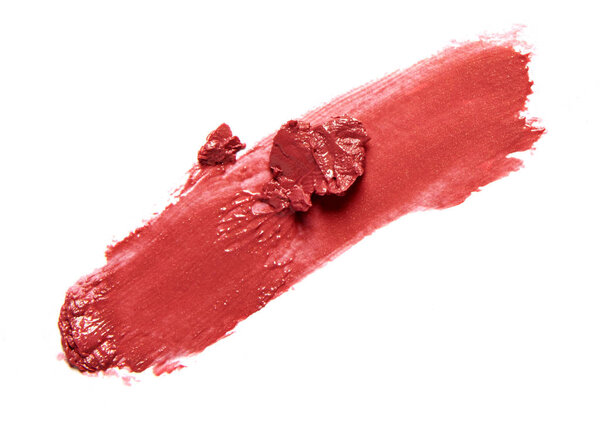 красный мазок помады мазок кисти изолированы на белом фоне
