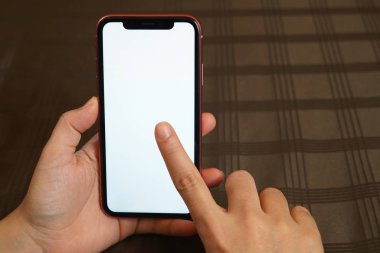 Kadın el playandholding iphone