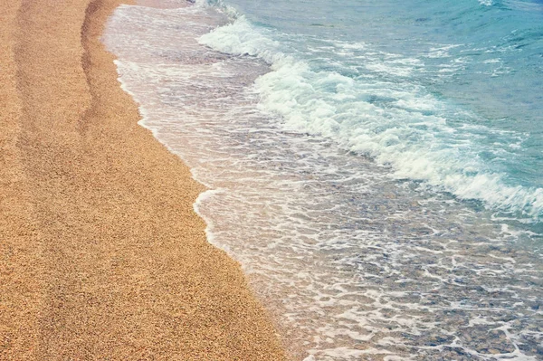 Zandstrand, achtergrond. Montenegro, Adriatische Zee, baai van Kotor — Stockfoto