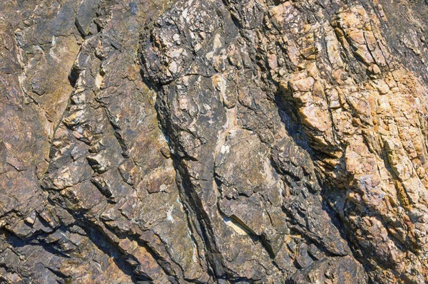 Textura de acantilado de montaña costera en Montenegro en un día soleado, fondo — Foto de Stock